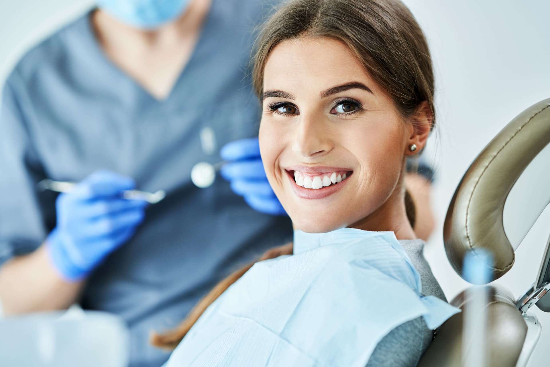 Smiling new patient in the dental chair at Goldthorn Dental Practice