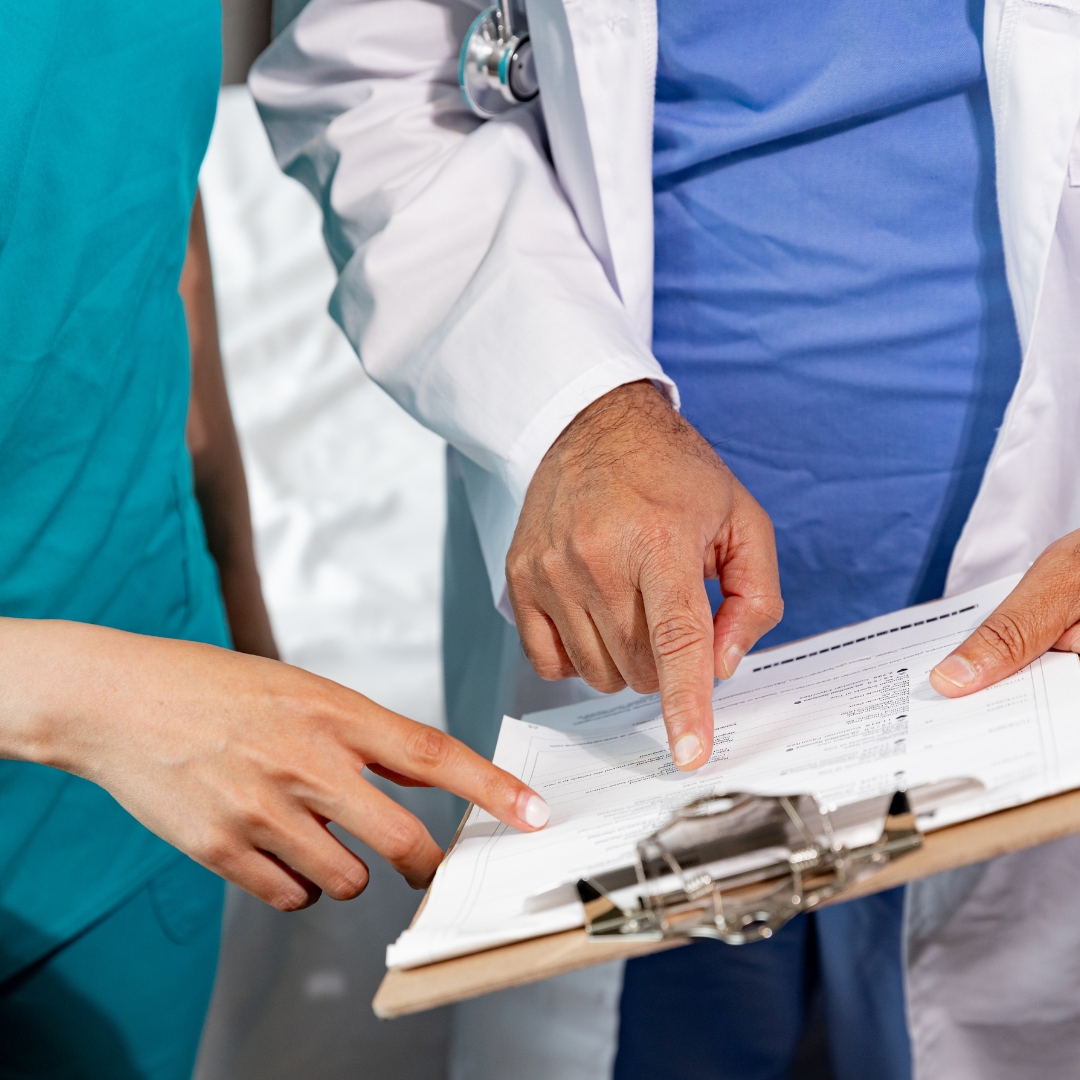 Dental team reviewing a patient treatment plan